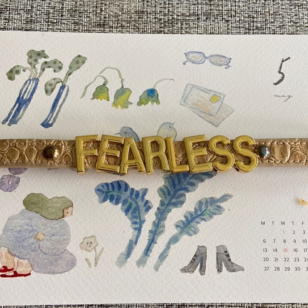 Bracelet candy arm gold color  words cream leather